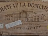a wooden box with a label on it sitting on a table