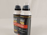 two bottles of axel men ' s deodorante and a bottle of axel men ' s deodorante on a white background