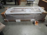a couch that has been wrapped up in a room