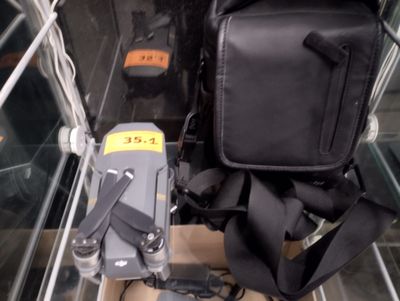 a black bag and a black bag on a shelf