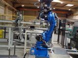a robot that is standing on a platform in a building