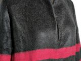 a close up of a woman ' s coat on a mannequin mannequin