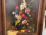 a picture of a painting of flowers in a vase on a table