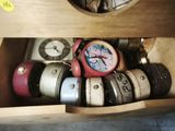 a clock that is sitting in a wooden box