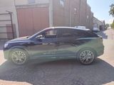 a picture of a car parked on the side of the road