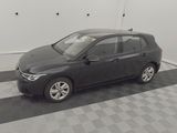 a black car that is parked in a garage