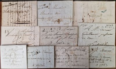 many old letters that are on the table together