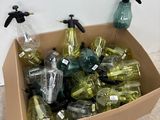 a cardboard box filled with bottles and bottles of water