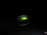 an image of a computer mouse glowing in the dark