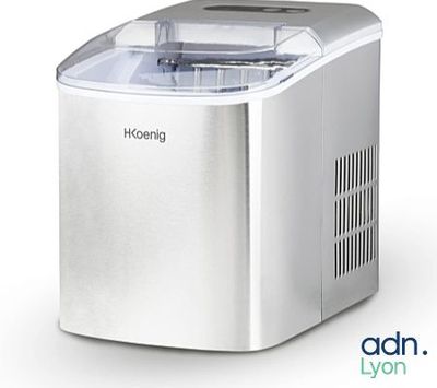 a close up of a small ice maker on a white background