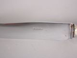 a knife that is sitting on a table