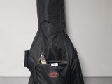 an image of a guitar case with a guitar inside of it