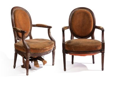 pair of early 20th century french walnut armchairs with leather upholstered seats
