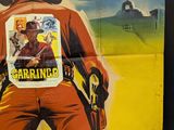 movie poster of a man in a cowboy outfit with a gun in his hand
