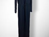 navy blue jumpsuit with long sleeves and a tie belt