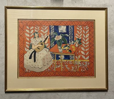 tableau représentant un homme jouant de la guitare et une femme assise à une table