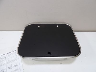 an image of a black and silver device sitting on a table