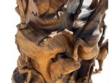 a vase made of wood that is sitting on a table
