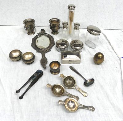 a lot of silver objects on a table