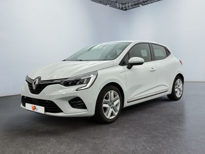 a white car in a white room with a black floor