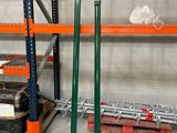 a large rack with many items in it in a warehouse