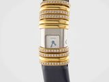 a close up of a wrist watch with diamonds on it