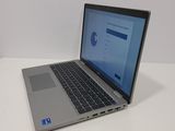 a laptop computer that is sitting on a table
