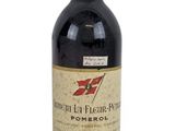 a bottle of wine that is sitting on a table