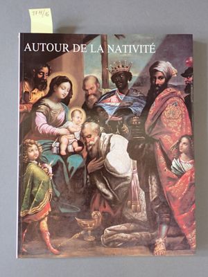 une photo d'un livre sur laquelle figure un homme tenant un bébé dans ses bras