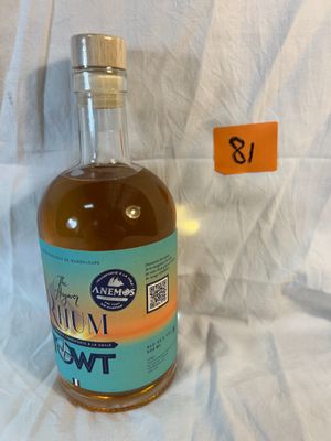 a bottle of liquor that is sitting on a table