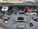 a car engine that is under the hood of a car