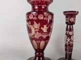 two vases sitting next to each other on a table