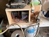 an image of a dirty kitchen with a lot of clutter