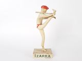 wooden figurine of a baseball player holding a bat on a base