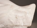 a close up of a white object on a table