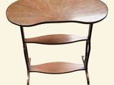 a wooden table with a shelf underneath it