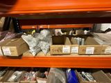 boxes of assorted items are stacked on a shelf in a store