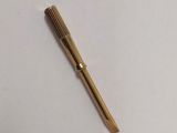 a close up of a pen laying on top of a white surface