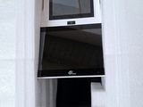 a box with a computer and a cell phone inside of it