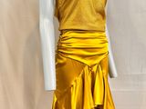 the mannequin is wearing a yellow dress with ruffles on it