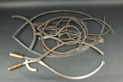 a lot of old tools that are laying on the table