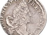 gros plan d'une pièce de monnaie sur fond blanc