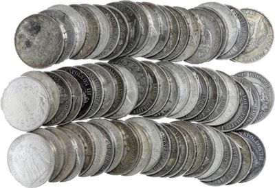 a lot of coins that are stacked on top of each other