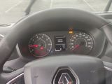 dashboard of a car with a steering wheel and gauges on it