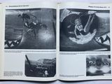 an open book with pictures of people riding on surfboards