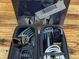an image of a box of tools sitting on a wooden table