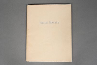an image of a book on a table with a gray background