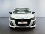 the front view of a white car in a white room