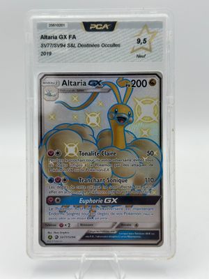 a close up of a pokemon card in a plastic holder