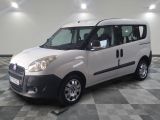 a picture of a white van parked on a checkered floor